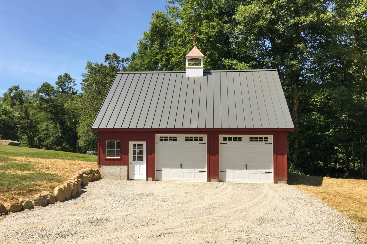 red 2-car garage with metal roof that was built for a customer near New Haven, CT
