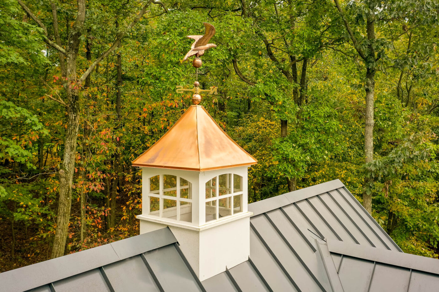picture of a white and copper cupola on a metal roof on a garage for sale in Fayetteville, NC