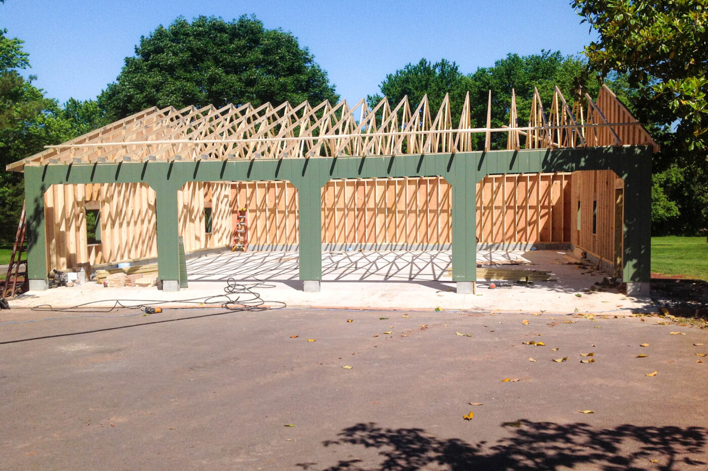 green 4-car garage being built for sale in Newark, NJ