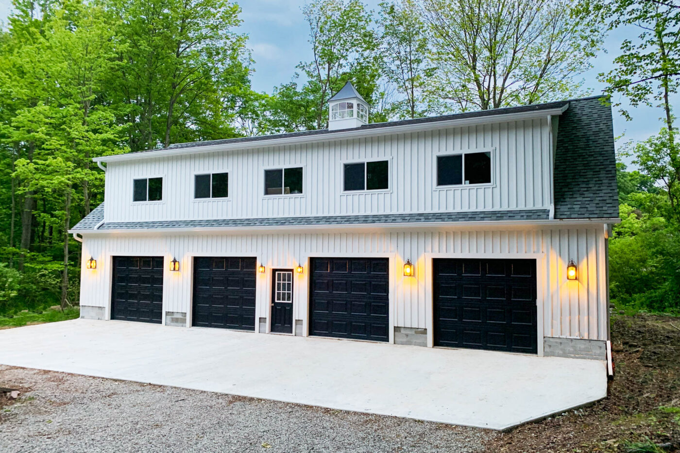 white 4-car garage with black garage doors for sale in Columbia, SC