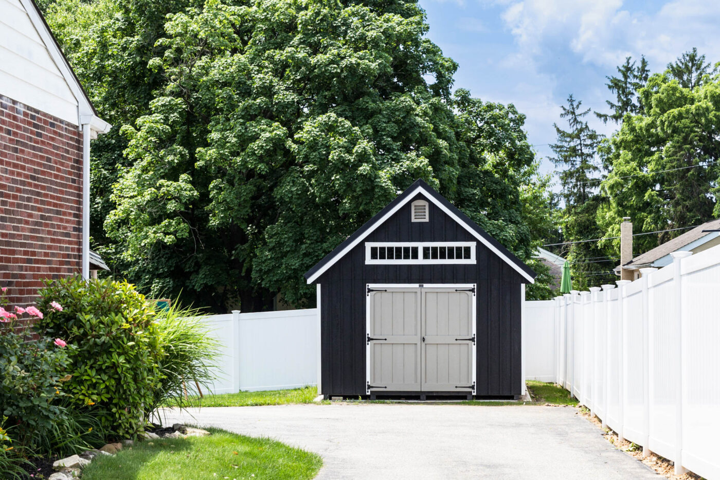 Black workshop shed with white trim for sale in Providence, RI