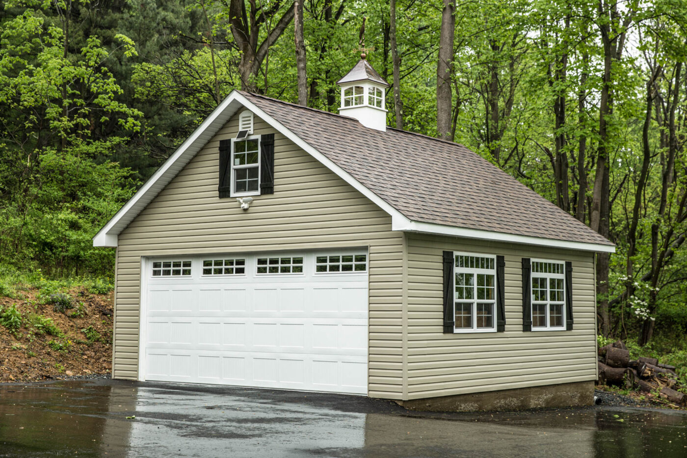a tan double-wide garage with black shutters for sale in Alexandria, VA
