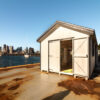 A white 10x28 shed in East Boston, MA.