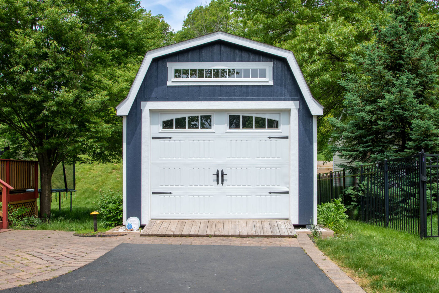 blue single-car premier dutch barn garage with white garage door and trim in Schwenksville, PA