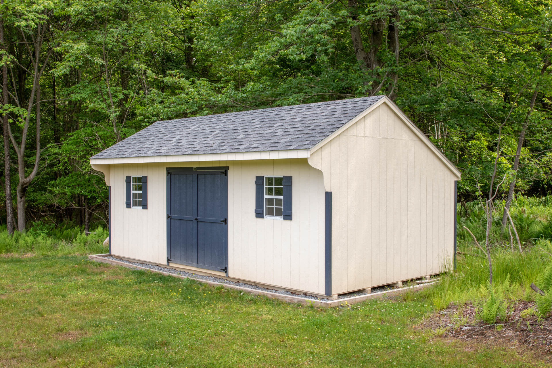 a navajo white 12x22 standard saltbox shed in mountain top pa with deep ocean trim