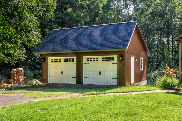A 24x24 garage with brown siding in Green Lane, PA.