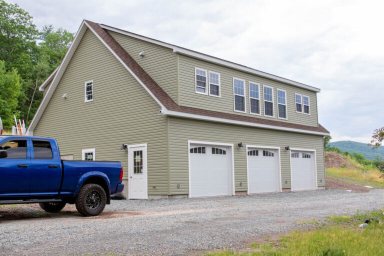 Sage 32x42 legacy 2-story workshop 2-car garage in tunkhannocko, pa with white trim and brown roof