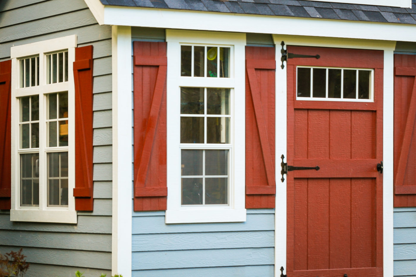 A shed with clapboard siding