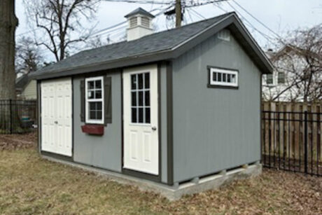 gray blue workshop classic a-frame shed with bronze shutters