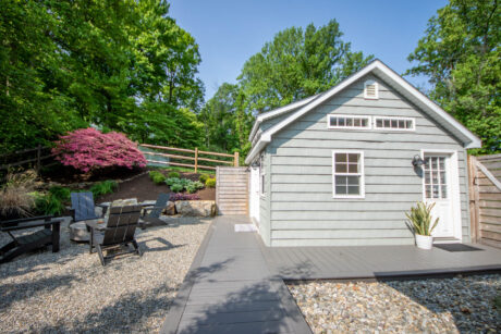 gray 14x12 wooden premier workshop shed with dormer and white windows and doors in Exton, PA