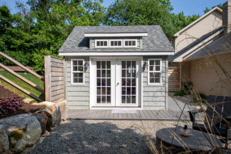 gray 14x12 wooden premier workshop shed with dormer and white windows and doors in Exton, PA