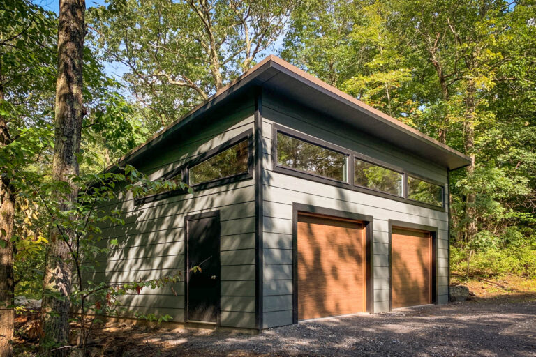 modern 3-car garage for sale built by Sheds Unlimited