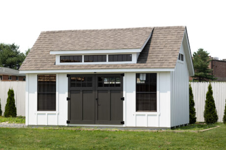 a white premier workshop shed with dormer built by Sheds Unlimited
