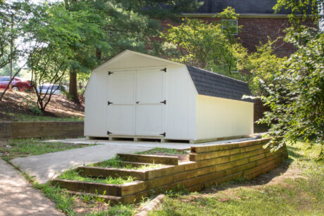 a white mini barn shed in Annapolis, MD built by Sheds Unlimited