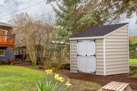 backyard with the house and table 