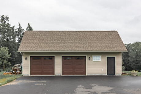 A 28-36 single-story standard saltbox two-car garage in Wilton, NH