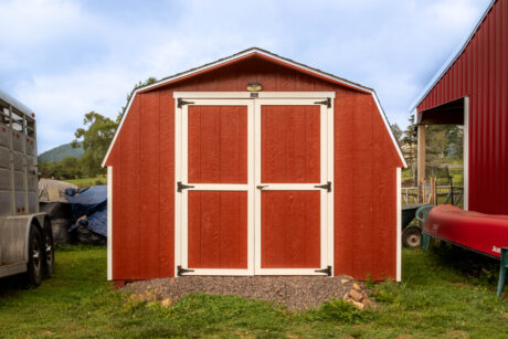 A red and white 10x10 mini barn in Weatherly, PA.