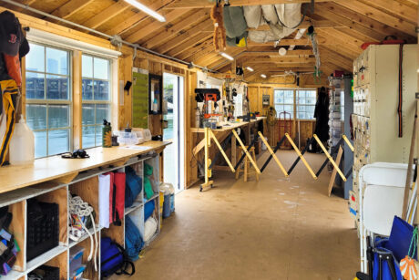 The interior of a 10x28 shed with a workbench in East Boston, MA.