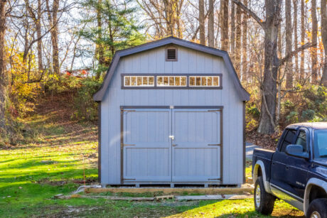 A 12x20 shed with a truck beside it in Hydes, MD.