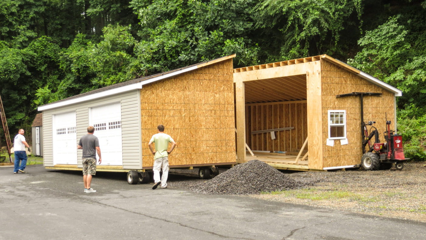 delivering and installing modular double wide standard workshop amish built garages