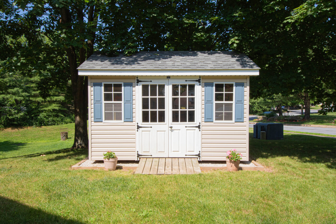 exterior of tan wooden outdoor bike shed for sale