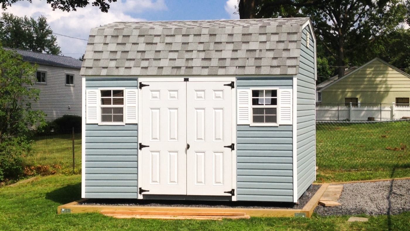 exterior of blue and white bike shed for sale