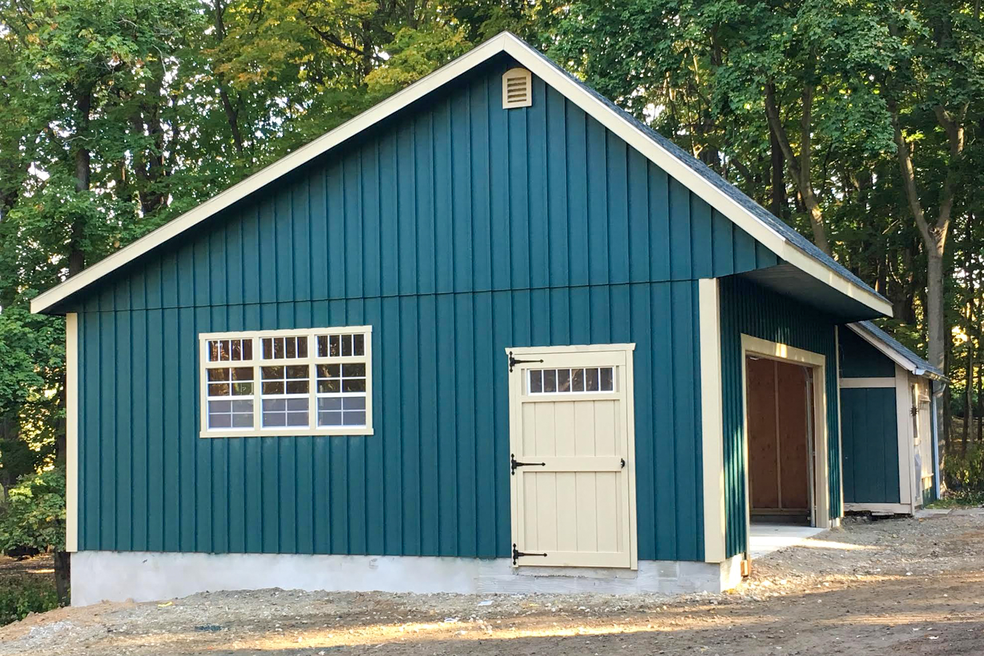 blue board and batten garage for sale