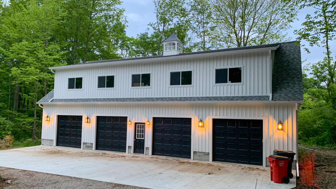 exterior of four car board and batten garage for sale near PA