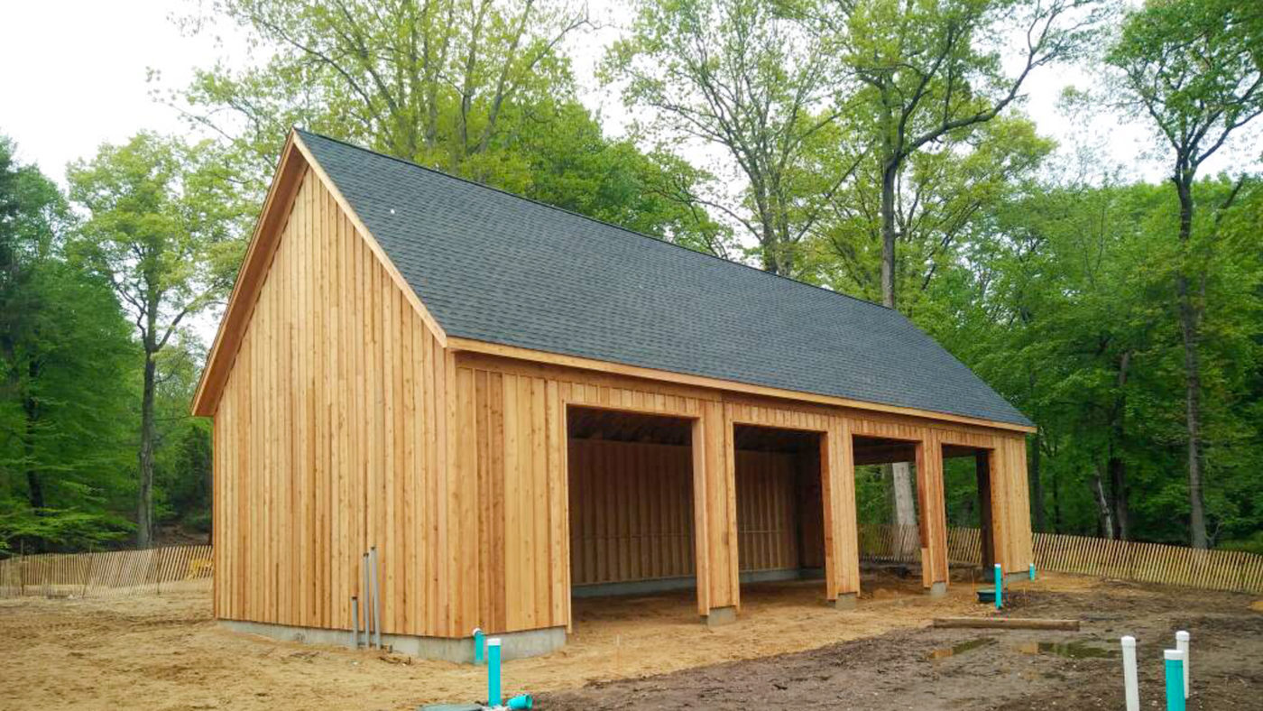exterior of wooden board and batten siding on garage for sale