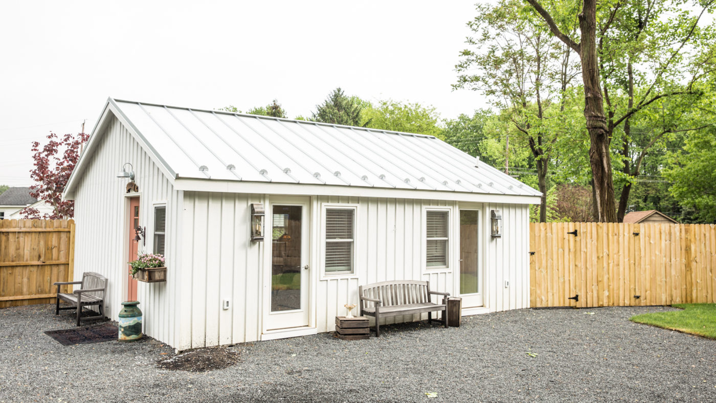 exterior of white double wide shed for sale