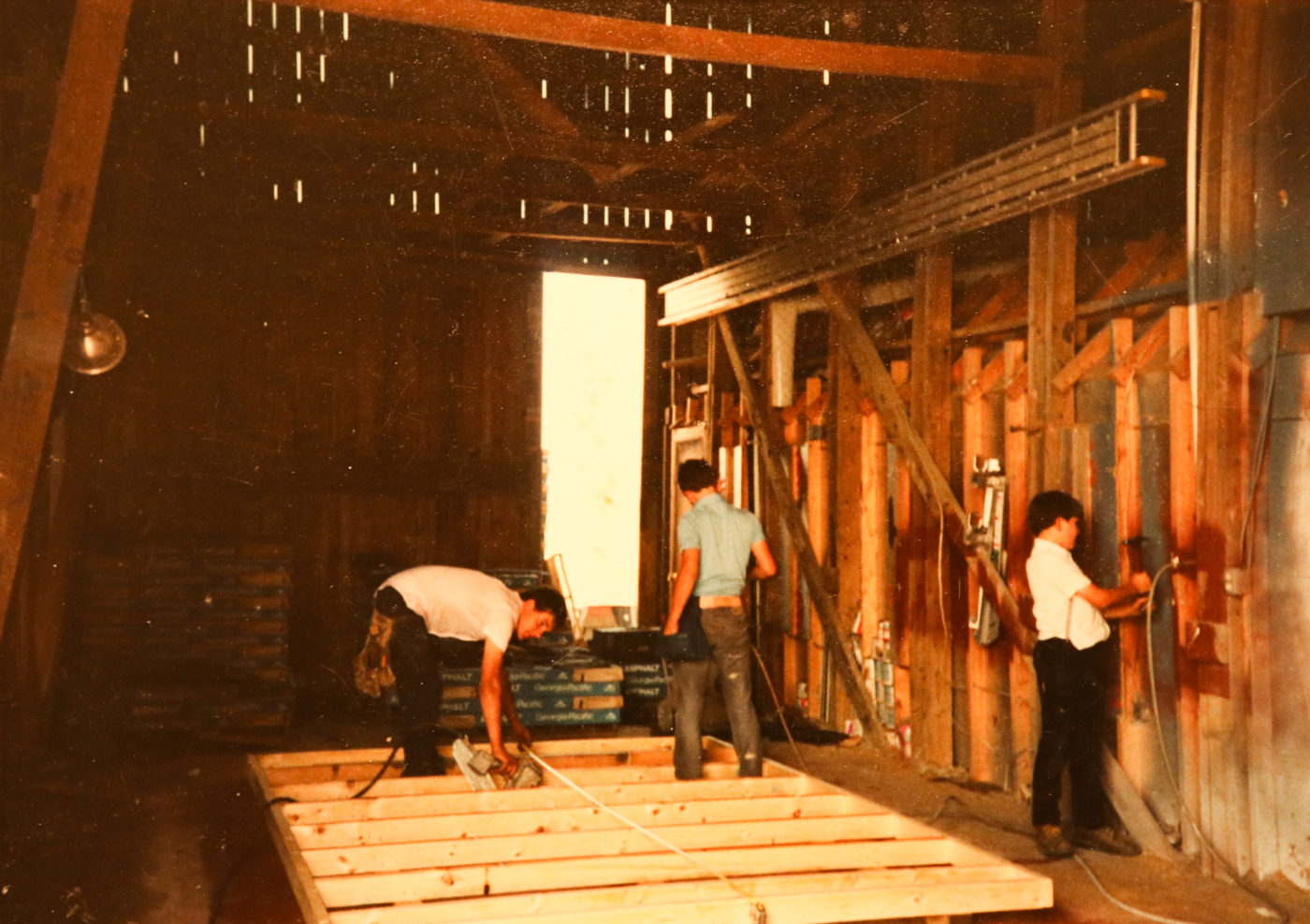 men working on a quality storage barn