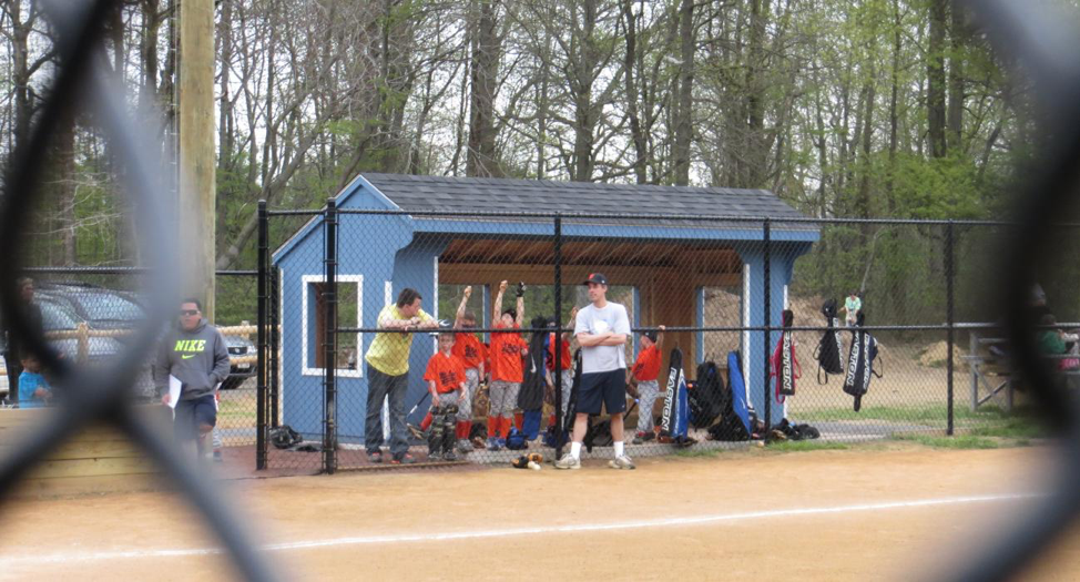 exterior of baseball storage shed used as a dugout