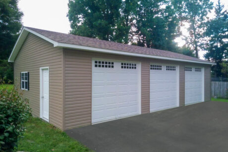 24x38 multiple car workshop garage with vinyl siding