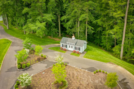 Aerial view of a 14x28 single-car garage in Gladwyne, PA with a cupola and transom dormer
