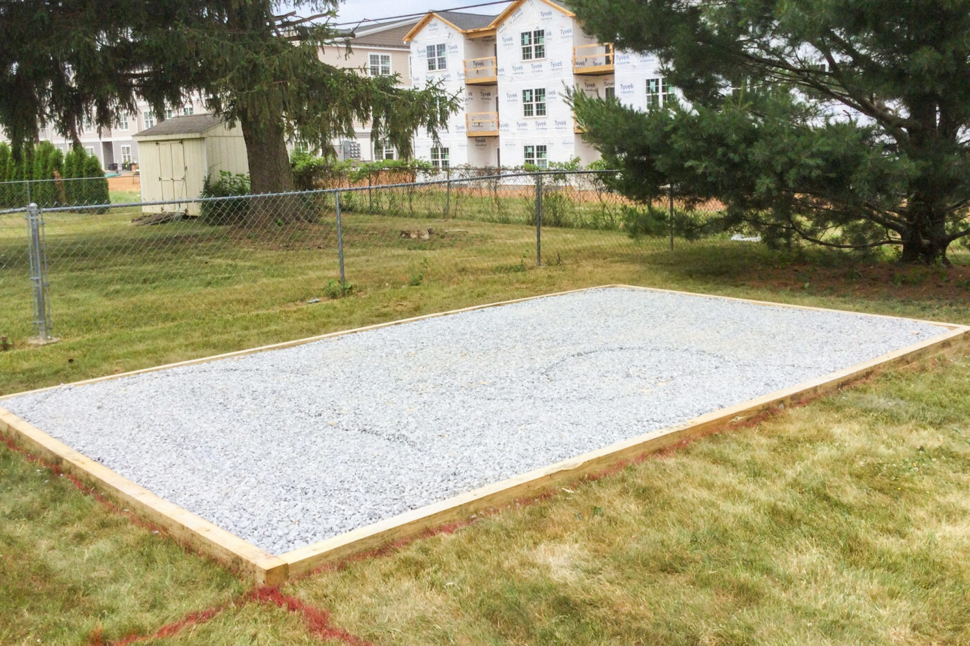 freshly layed gravel in gravel shed pad