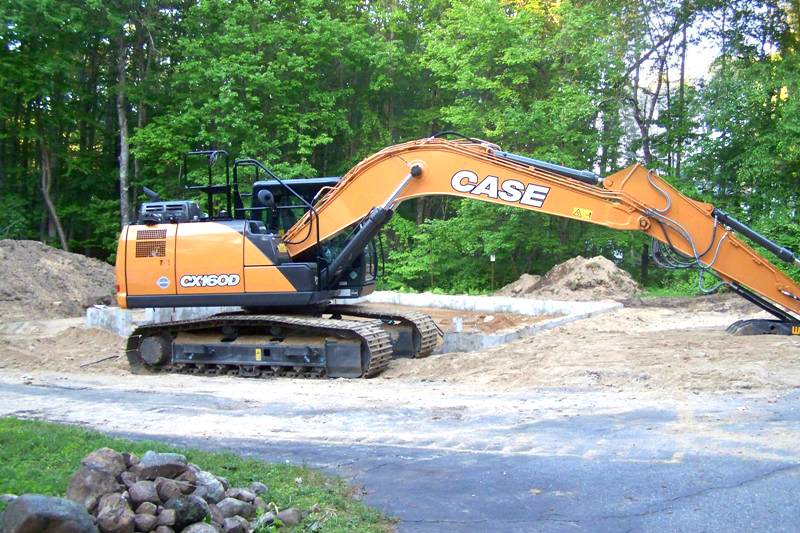 excavator for 2 car garage with lift