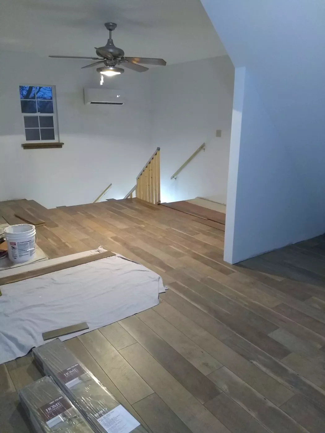 Two-Story Prefab Garage Provides a Home for a Virginia Grandma 12 laminate floor on the garage