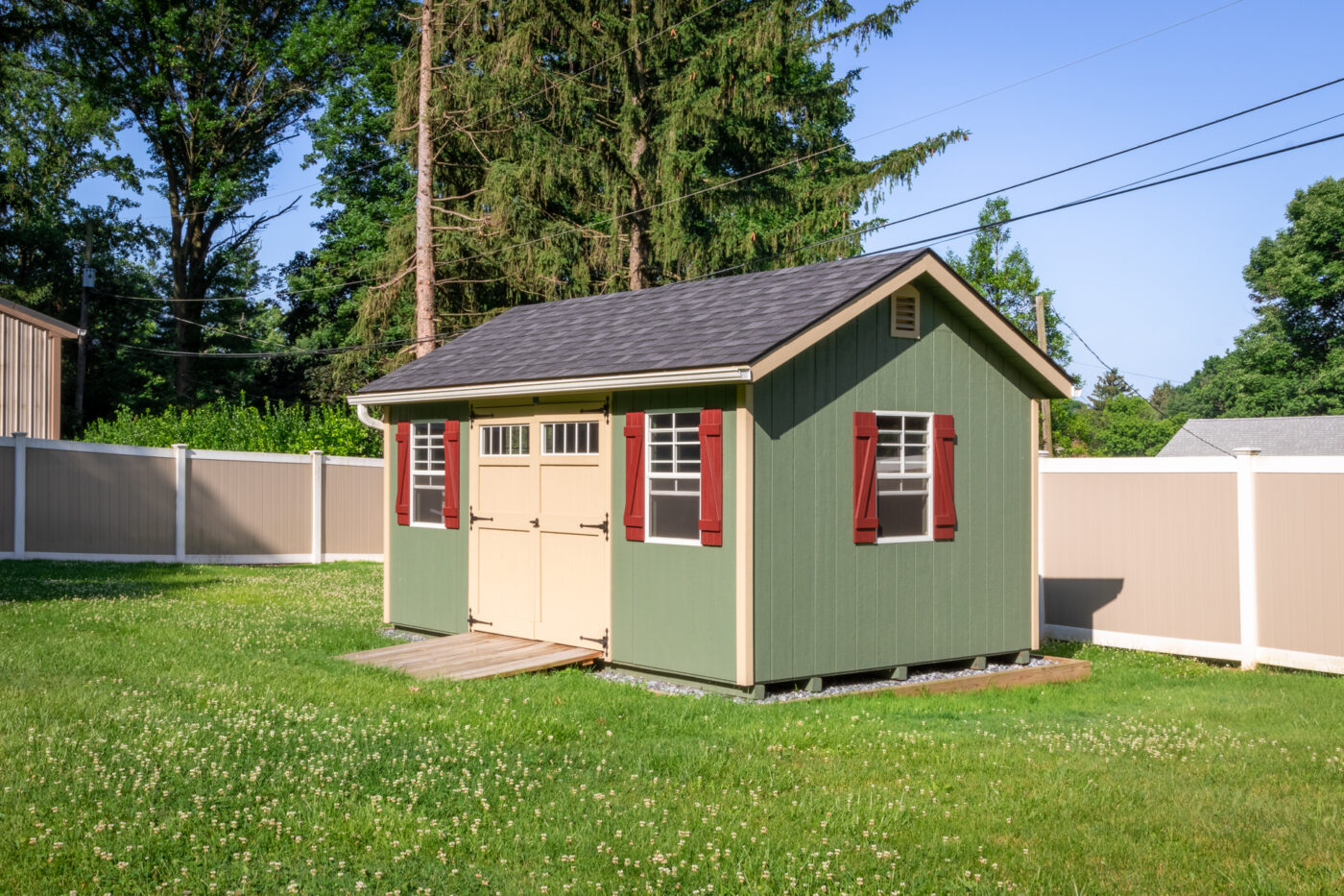 exterior of green and red workshop shed for sale in nj